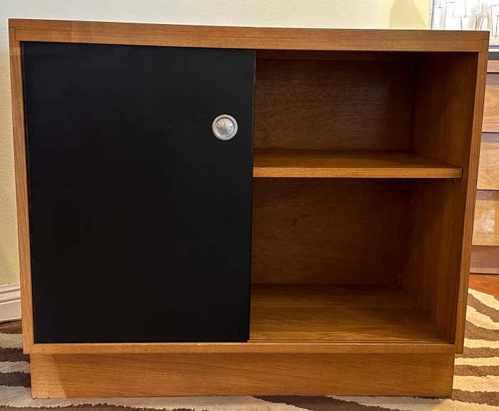 Mid-Century Little Blonde Oak Credenza with Black Sliding Doors by Woodland