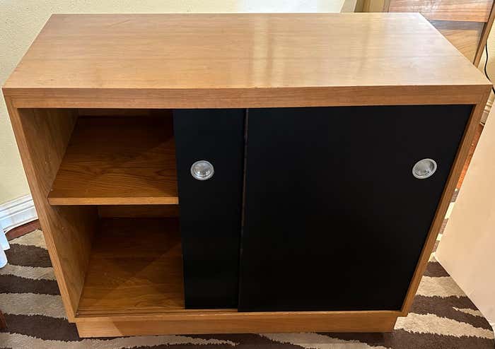 Mid-Century Little Blonde Oak Credenza with Black Sliding Doors by Woodland