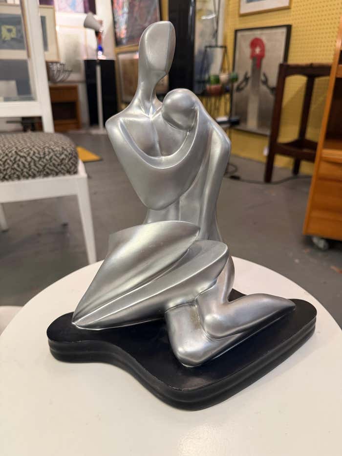 Two Lovers, Silver Plaster Sculpture on Black Plaster Base