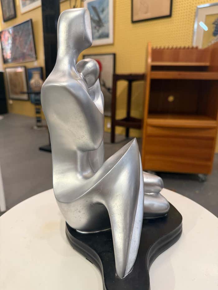 Two Lovers, Silver Plaster Sculpture on Black Plaster Base