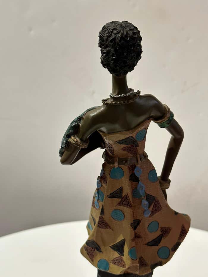 "Dancing in the Heat" African Figurine Sculpture Posing With Her Large Leaf Fan