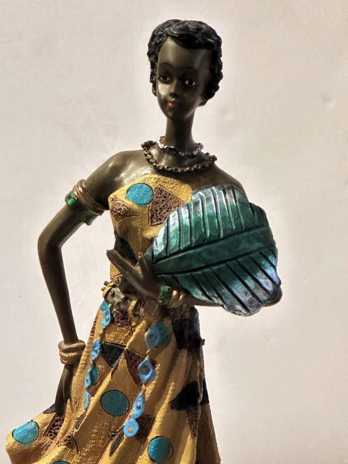 "Dancing in the Heat" African Figurine Sculpture Posing With Her Large Leaf Fan