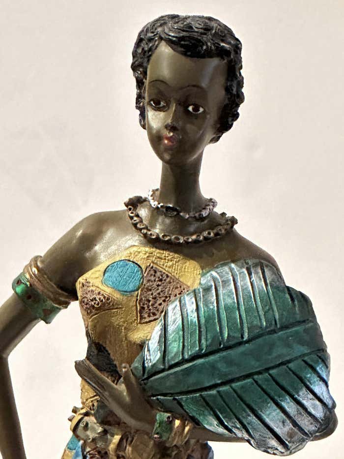 "Dancing in the Heat" African Figurine Sculpture Posing With Her Large Leaf Fan