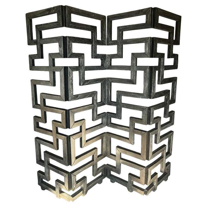 A black Cerused Oak Room Divider in the style of Eileen Gray